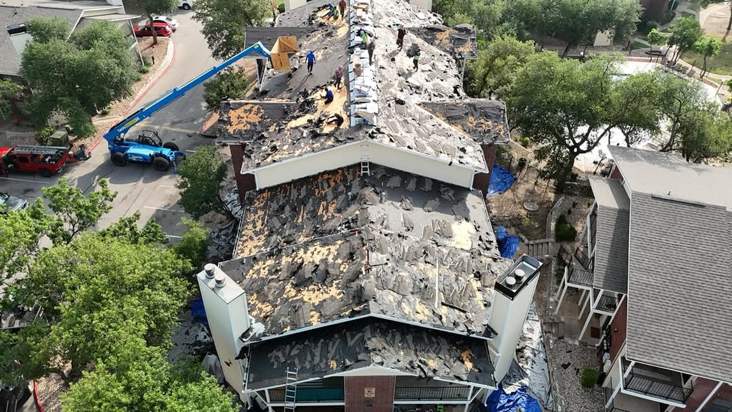 Storm damaged roof aerial view